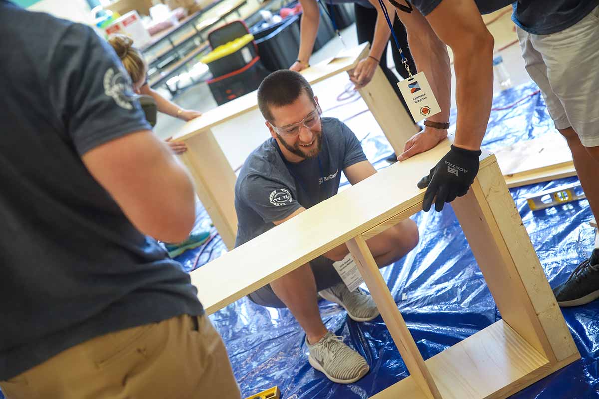 Blue blood AI Shared Services Participate in Service Day with City Year at the Joseph Lee School